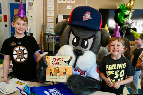 Portland Sea Dogs mascot, Slugger, with second graders from Gilbert Elementary School in Augusta.